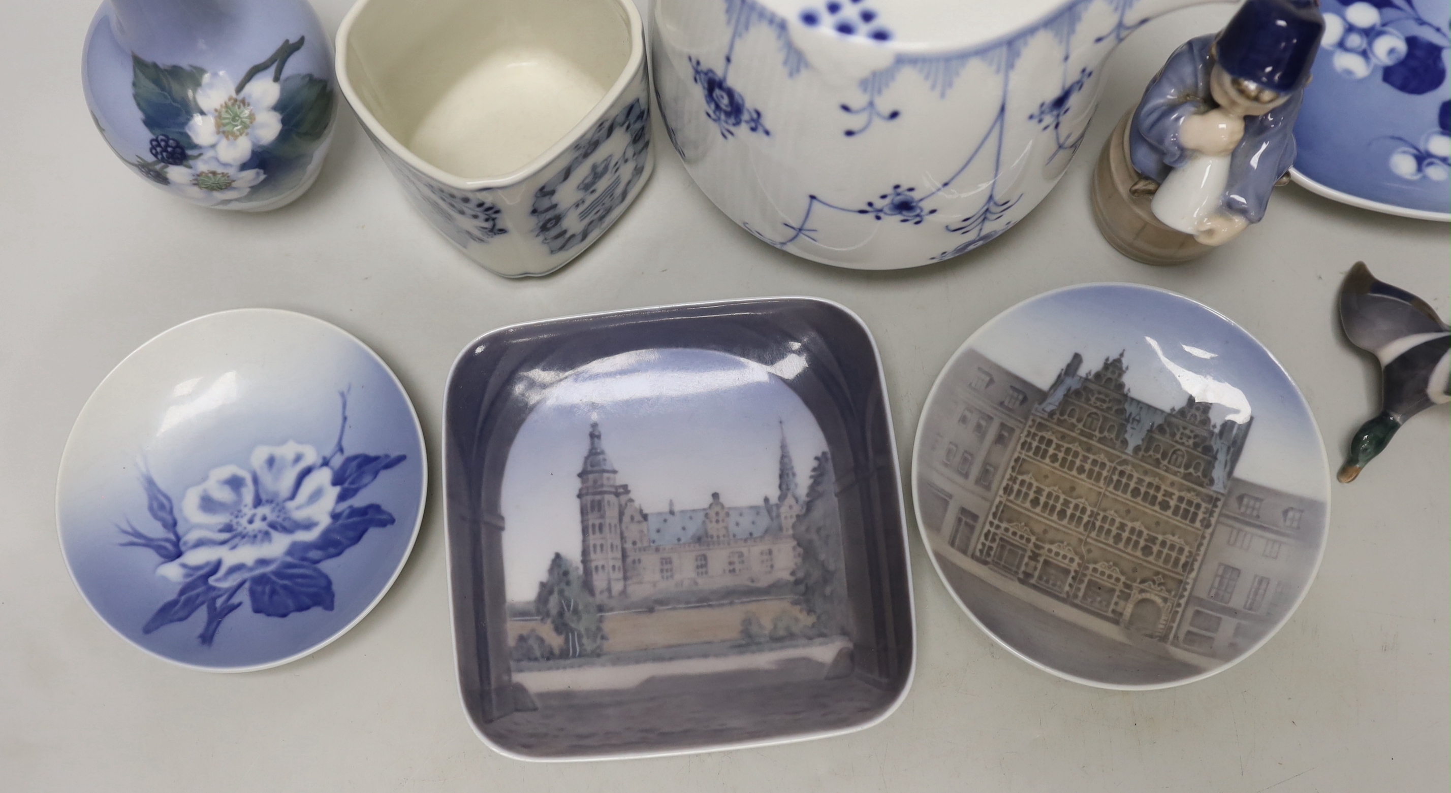 A group of Royal Copenhagen porcelain including an onion pattern teapot